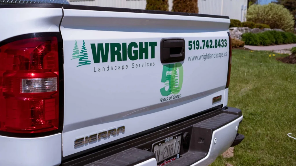 Wright Landscape Services logo on a car